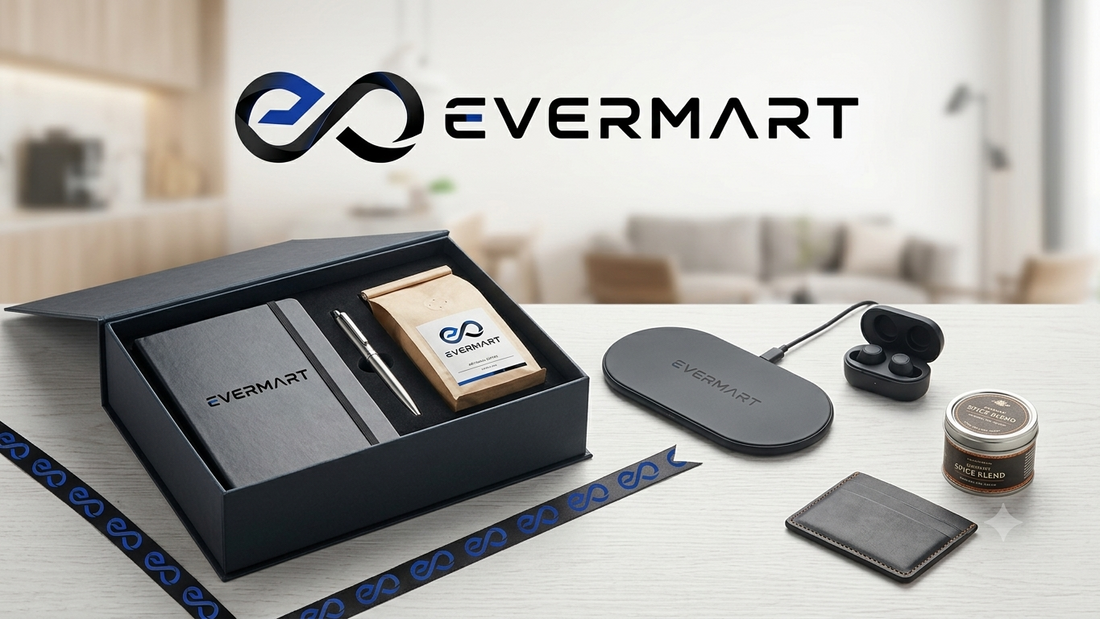 Premium Evermart corporate gift box featuring a black notebook, pen, coffee bag, wireless charger, earbuds, and leather cardholder on a light wooden table.